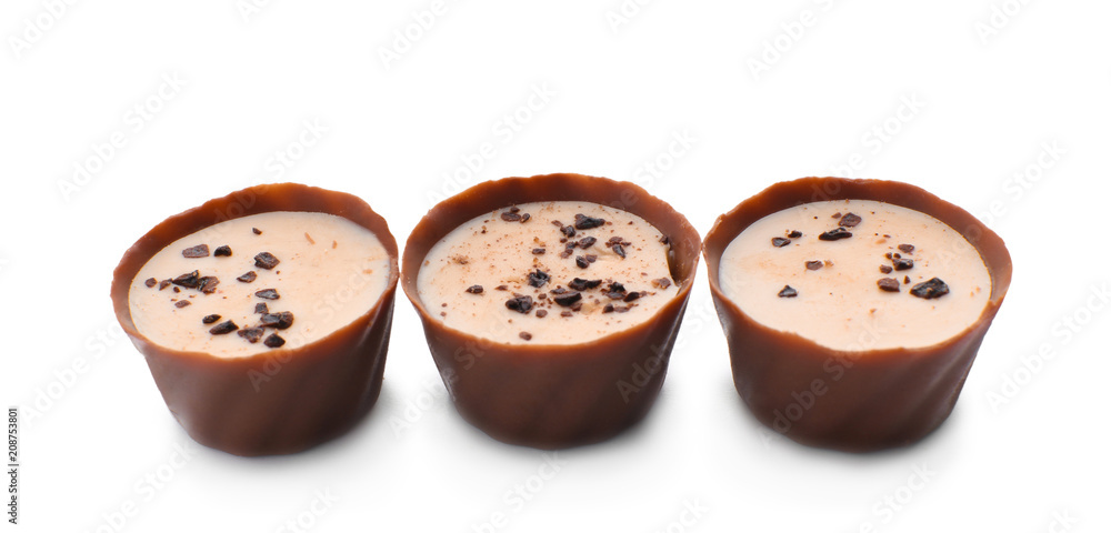 Tasty chocolate candies on white background Tasty chocolate candies on white background