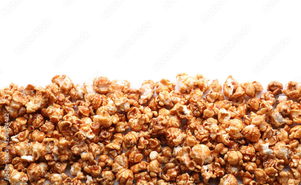 Delicious popcorn with caramel on white background Delicious popcorn with caramel on white background