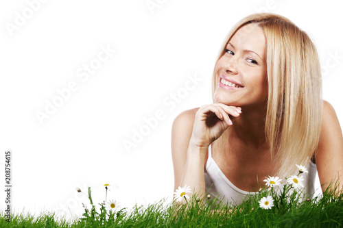 Woman on grass with flowers