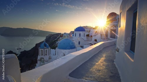 Santorini Greece. Famous village of Oia streets. Amazing atmosphere of morning peace. Sunrise peace.