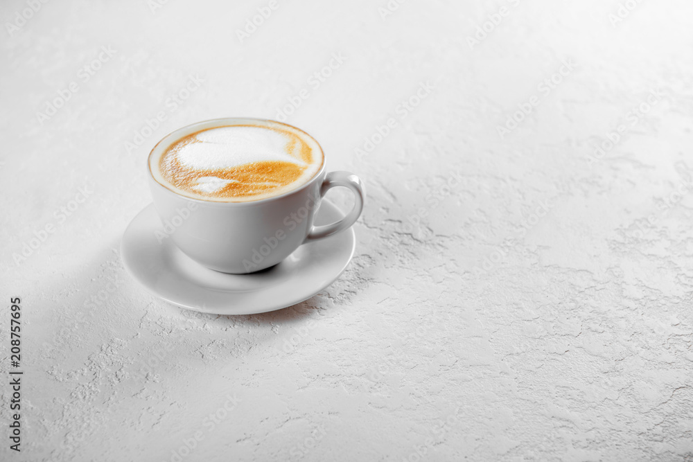 Cup of cappuccino coffee on white background Cup of cappuccino coffee on white background