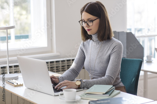 Businesswoman Typing on her Laptop © LStockStudio