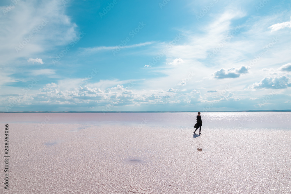Fototapeta premium Silhouette women walking on the famous tourist destination Salt Lake (Turkish: Tuz Golu ) is the second largest lake in Turkey.