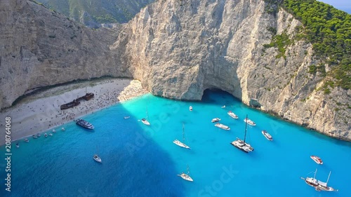 Yacht sailing at windy day. Freedom of Yachting at opened sea / ocean. Aerial, drone video.