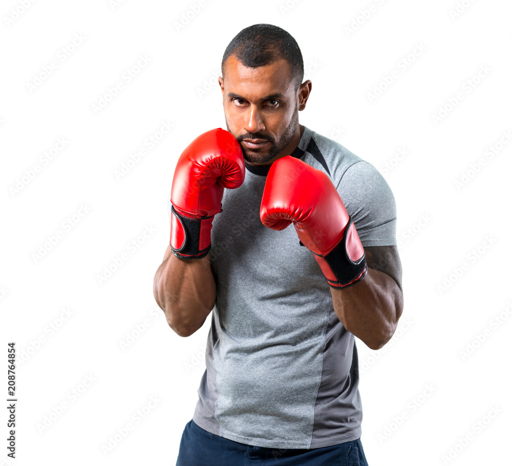 Strong sport man with boxing gloves on isolated white background