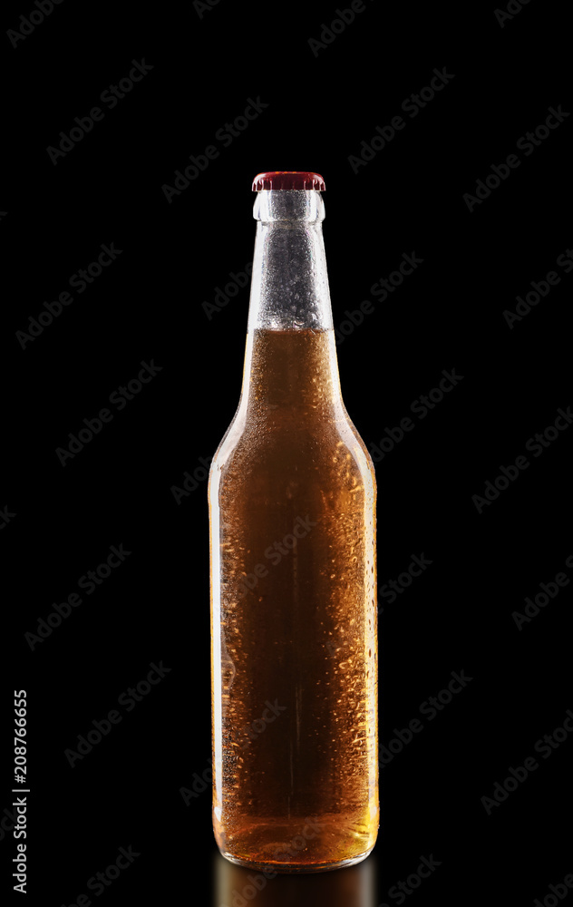 Fresh beer in glass bottle on black background Fresh beer in glass bottle on black background