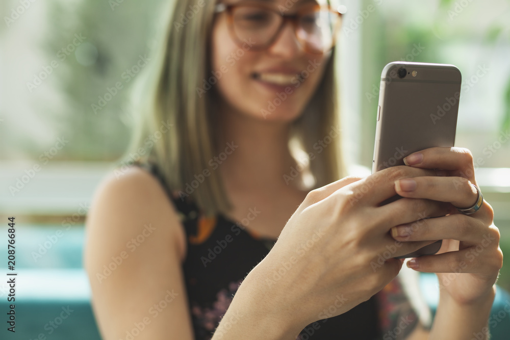 woman using her Mobile Phone