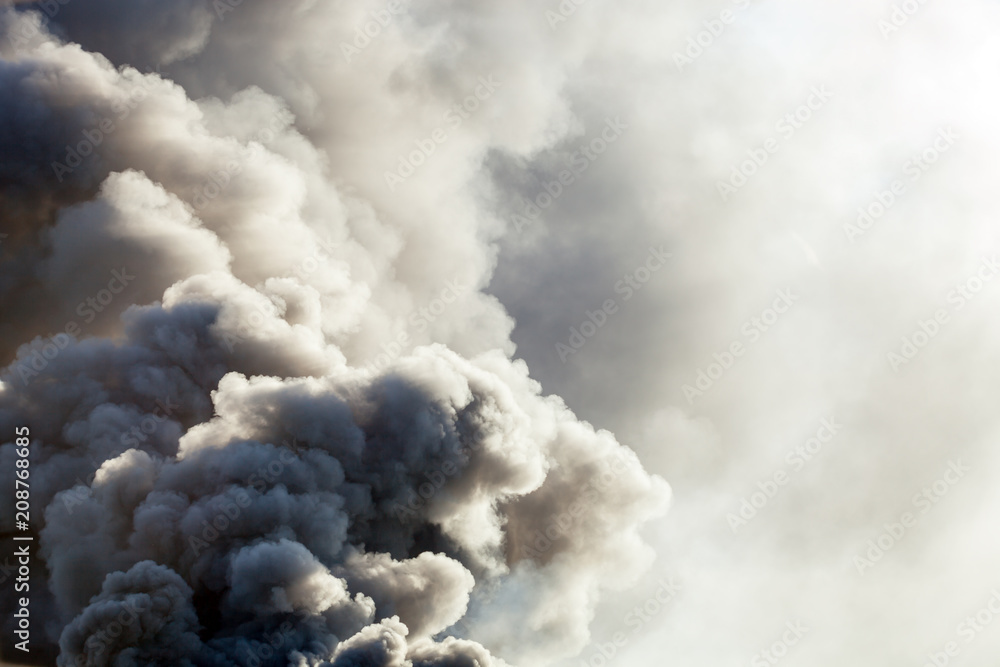 Huge dark smoke from the fire Huge dark smoke from the fire