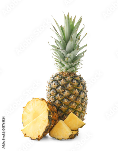 Delicious pineapple and slices on white background