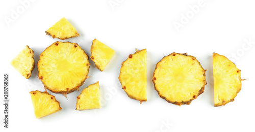 Composition with delicious sliced pineapple on white background