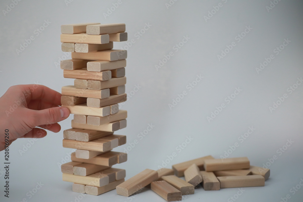 Board game jenga tower of wood sticks Board game jenga tower of wood sticks