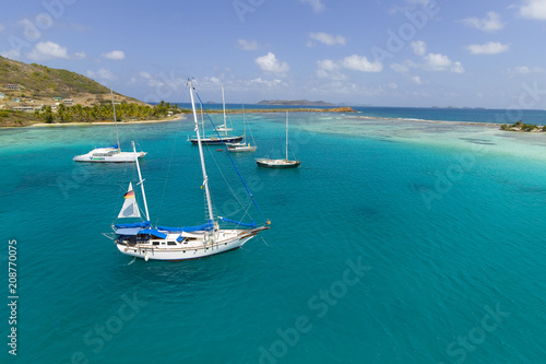 anchoring sailbooats in the shallow waters of Union Island,St.Vincent and Grenadines,West Indies