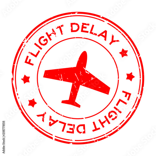 Grunge red flight delay word with airplane icon round rubber seal stamp on white background