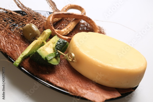 Set of small wheel of cheese photo
