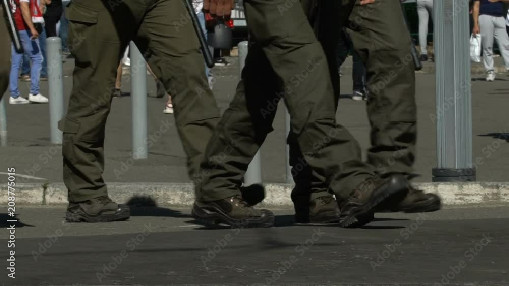 Men in military uniform cordon off building, threat of terrorist act, slow-mo Men in military uniform cordon off building, threat of terrorist act, slow-mo