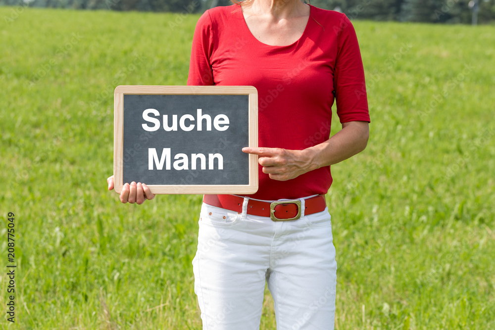 Eine Frau hat ein Schild mit Suche Mann Stock Photo Adobe Stock
