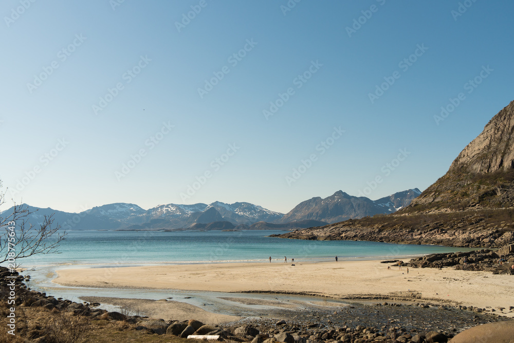Rorvikstranda beach and Gimsoystraumen fjord near Henningsvaer at Lofoten Islands / Norway