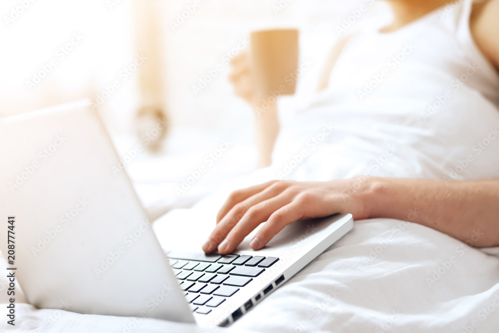 Close up. Red haired awaking man lies in bed Close up. Red haired awaking man lies in bed