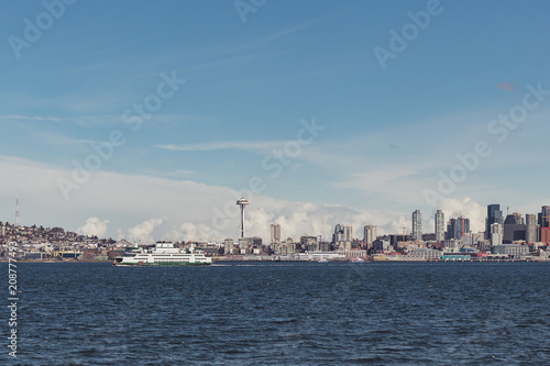 Seattle city skyline from Alki Beach in Washington with ferry and Space Needle