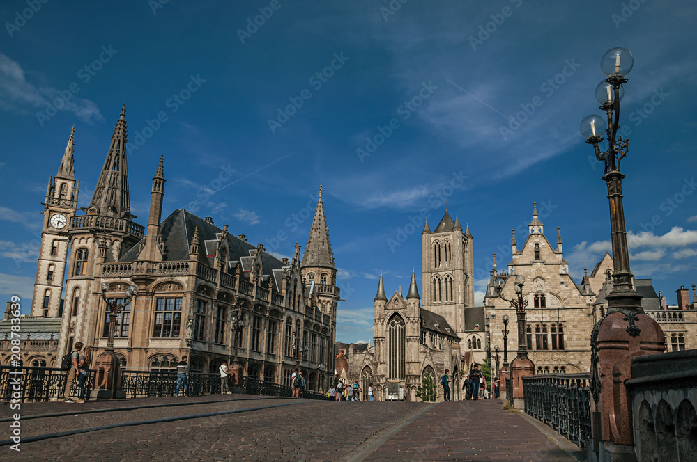 St Michael's Bridge, churches and Gothic buildings in Ghent. In addition to intense cultural life, the city is full of canals and Flemish architecture. Northern Belgium.