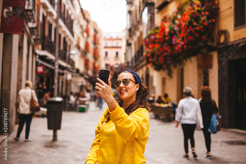 Woman touring the center of Madrid, tourism concept.