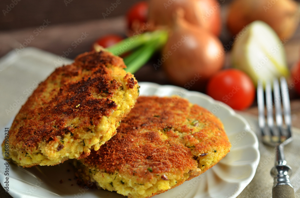 Vegetarian cutlets with eggs on a white plate Vegetarian cutlets with eggs on a white plate