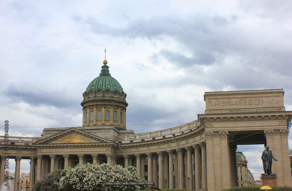 Kazan Cathedral (Cathedral of Our Lady of Kazan) in Saint Petersburg, Russia. Orthodox Cathedral and Museum, Famous Cultural Old City Landmark, on Gloomy Cloudy Background with Empty Sky Copy Space.