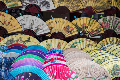 Traditional handicraft chinese fans at market in Yangshuo, China.