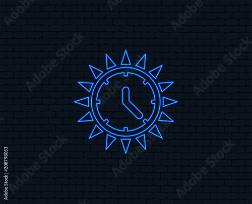 Neon light. Summer time icon. Sunny day sign. Daylight saving time symbol. Glowing graphic design. Brick wall. Vector