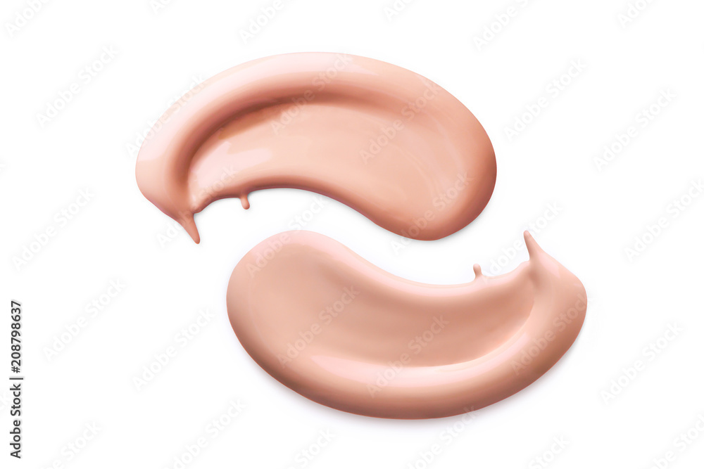 Makeup foundation cosmetic smear cream isolated on white background. Light beige liquid foundation sample smear Makeup foundation cosmetic smear cream isolated on white background. Light beige liquid foundation sample smear