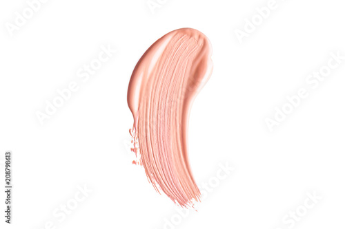 Makeup foundation cosmetic smear cream isolated on white background. Light beige liquid foundation sample smear