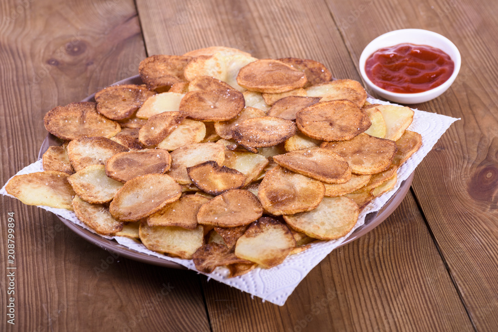 fried potato slices - homemade chips fried potato slices - homemade chips