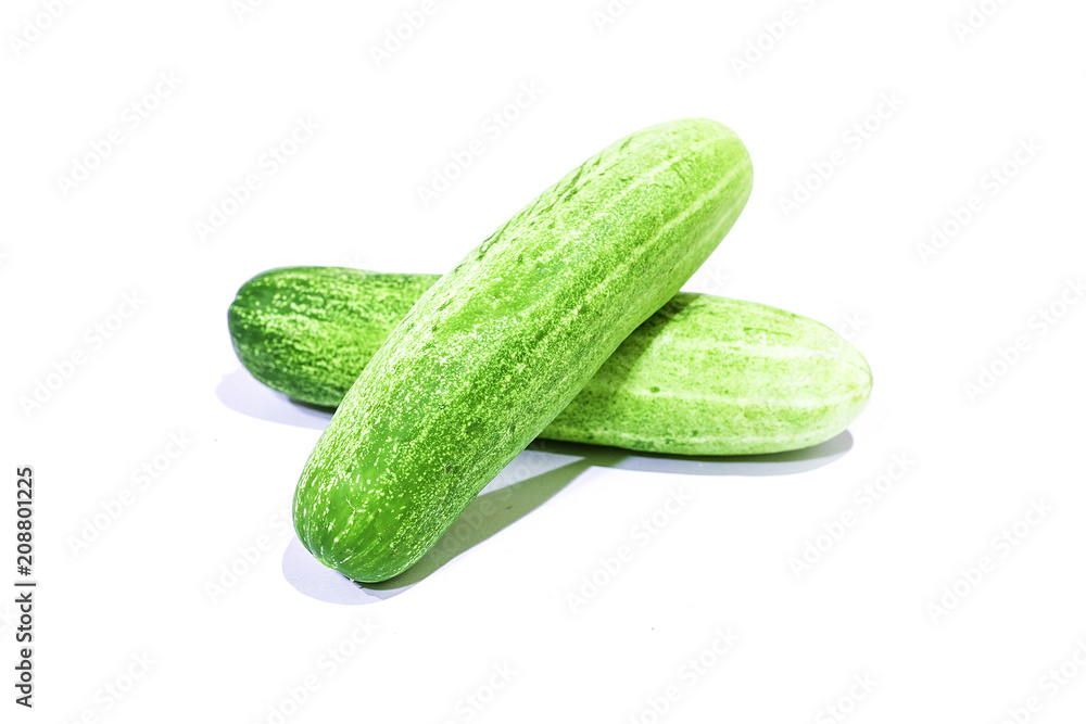 fresh cucumbers isolated on a white background. fresh cucumbers isolated on a white background.