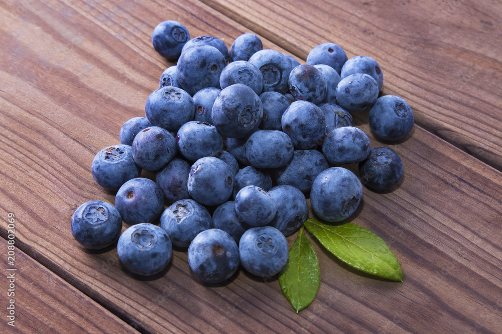 natural blueberries in wood, fruits of the forest natural blueberries in wood, fruits of the forest
