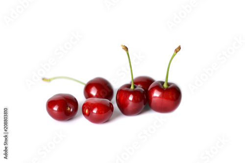 Ripe, juicy, red cherries isolated on white background.