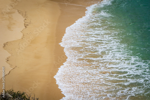 View of beautiful Marinha beach with crystal clear turquoise water near Carvoeiro town, Algarve region, Portugal