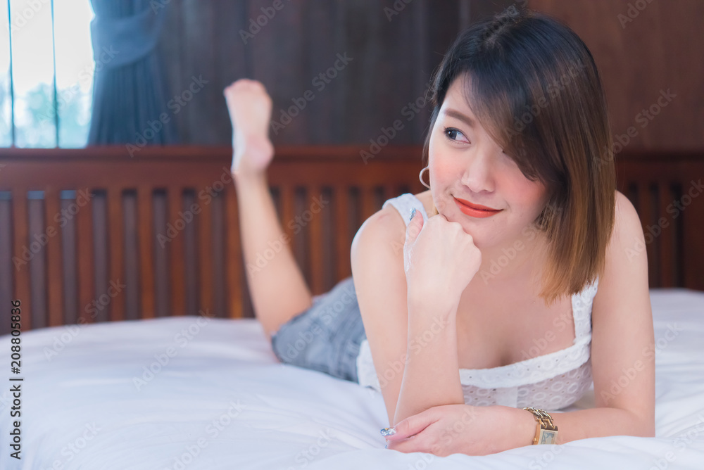 Portrait of beautiful asian sexy woman in the bedroom,Thailand people,Pose for take a picture, Portrait of beautiful asian sexy woman in the bedroom,Thailand people,Pose for take a picture,
