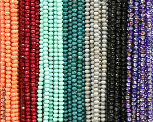 necklaces with pearls and colored gemstones in a jewelry