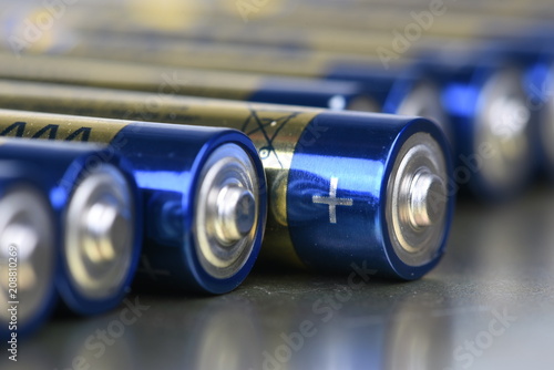 Bilde på lerret AAA alkaline batteries in perspective on metal background