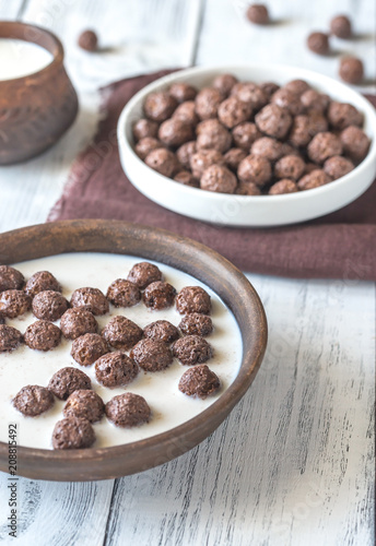 Bowl of chocolate corn balls with milk