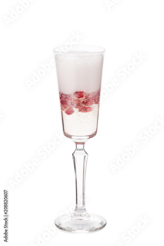 pomegranate mimosa with pomegranate grains inside and white creamy foam