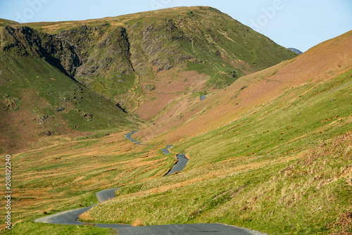 The winding single track road through the Newlands Pass in the  English Lake District photo