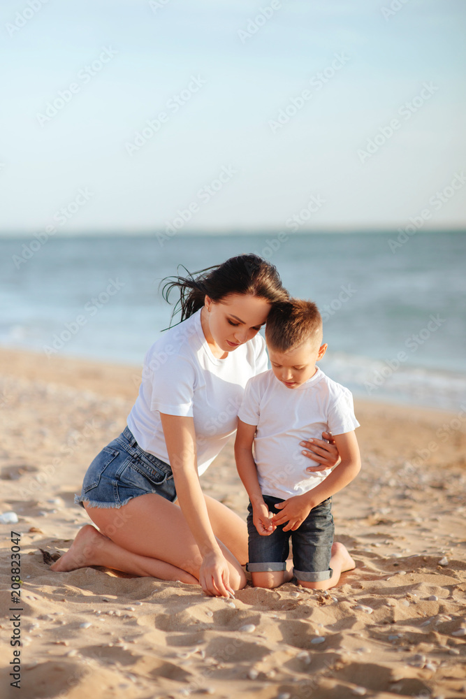 mother and son on the beach