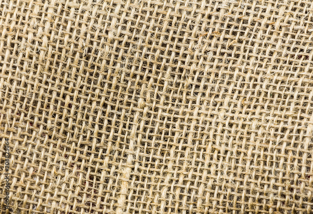 burlap cloth coarse natural jute wicker with large holes, rustic background base burlap cloth coarse natural jute wicker with large holes, rustic background base