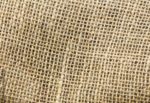 burlap cloth coarse natural jute wicker with large holes, rustic background base