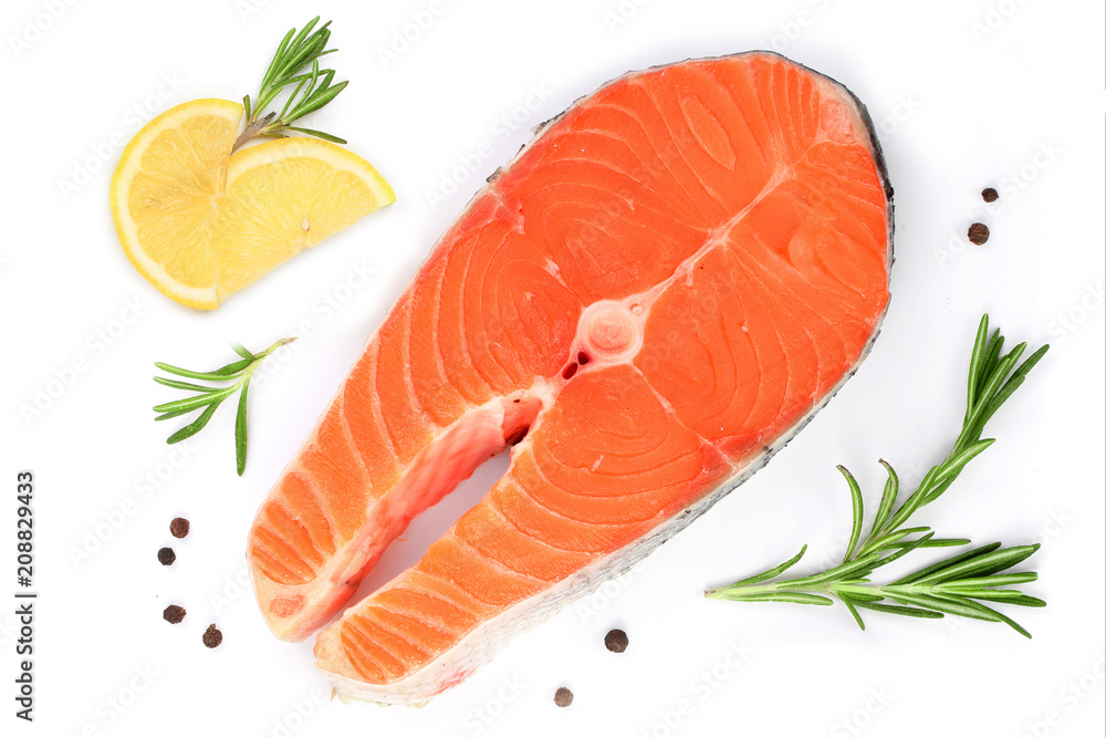 Slice of red fish salmon with lemon, rosemary and peppercorns isolated on white background. Top view. Flat lay Slice of red fish salmon with lemon, rosemary and peppercorns isolated on white background. Top view. Flat lay