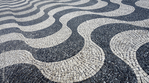 Lisbon pavement waves Handmade pavement (Calçada portuguesa) in Lisbon, Portugal. Praça Dom Pedro IV.
