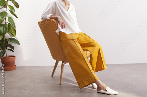 fashionable woman wearing culottes photo