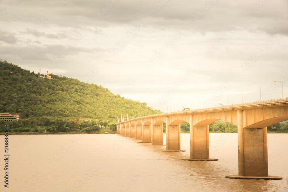 andscape bridge cross of khong river with sunlight at Pakse Champasak Laos