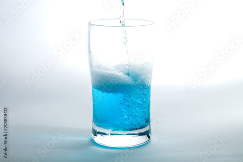 Glass of blue liquid